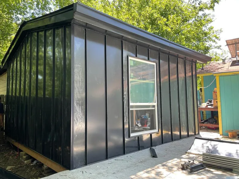 Black standing seam metal wall panels for Metal Roof Installation in Aspen